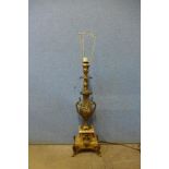 A gilt metal and onyx table lamp