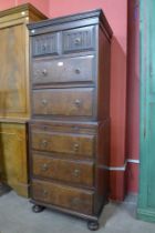 A Victorian oak and burr walnut chest on chest