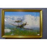 A Melvyn Buckley Spitfire print, framed