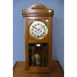 An oak wall clock