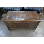 A George III panelled oak coffer