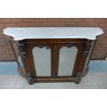 A Victorian figured walnut and marble topped credenza