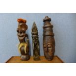 Two carved wooden African tribal figures and a mask