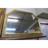 A gilt framed overmantel mirror