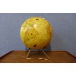 A jigsaw terrestrial globe on stand