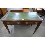 An Edward VII inlaid mahogany and green leather topped two drawer writing table