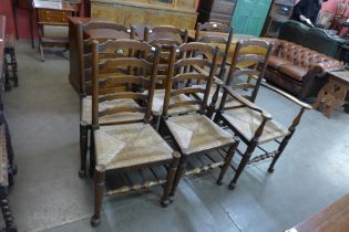 A set of six George III style elm rush seated ladderback chairs
