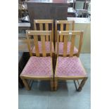 A set of four oak dining chairs