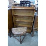 A Fyne Ladye Art Deco oak open bookcase and a stool