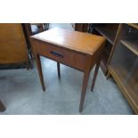 A teak single drawer side table