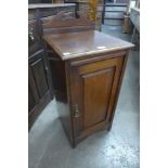 A Victorian walnut pot cupboard