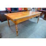 A 19th Century French cherrywood extending farmhouse table