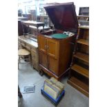 A mahogany cased gramophone cabinet and records