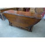 A George III style oak gateleg wake table