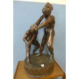 A large Japanese Meiji period carved hardwood figure group of two nude male wrestlers, 95cms h