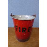 A vintage painted steel fire bucket