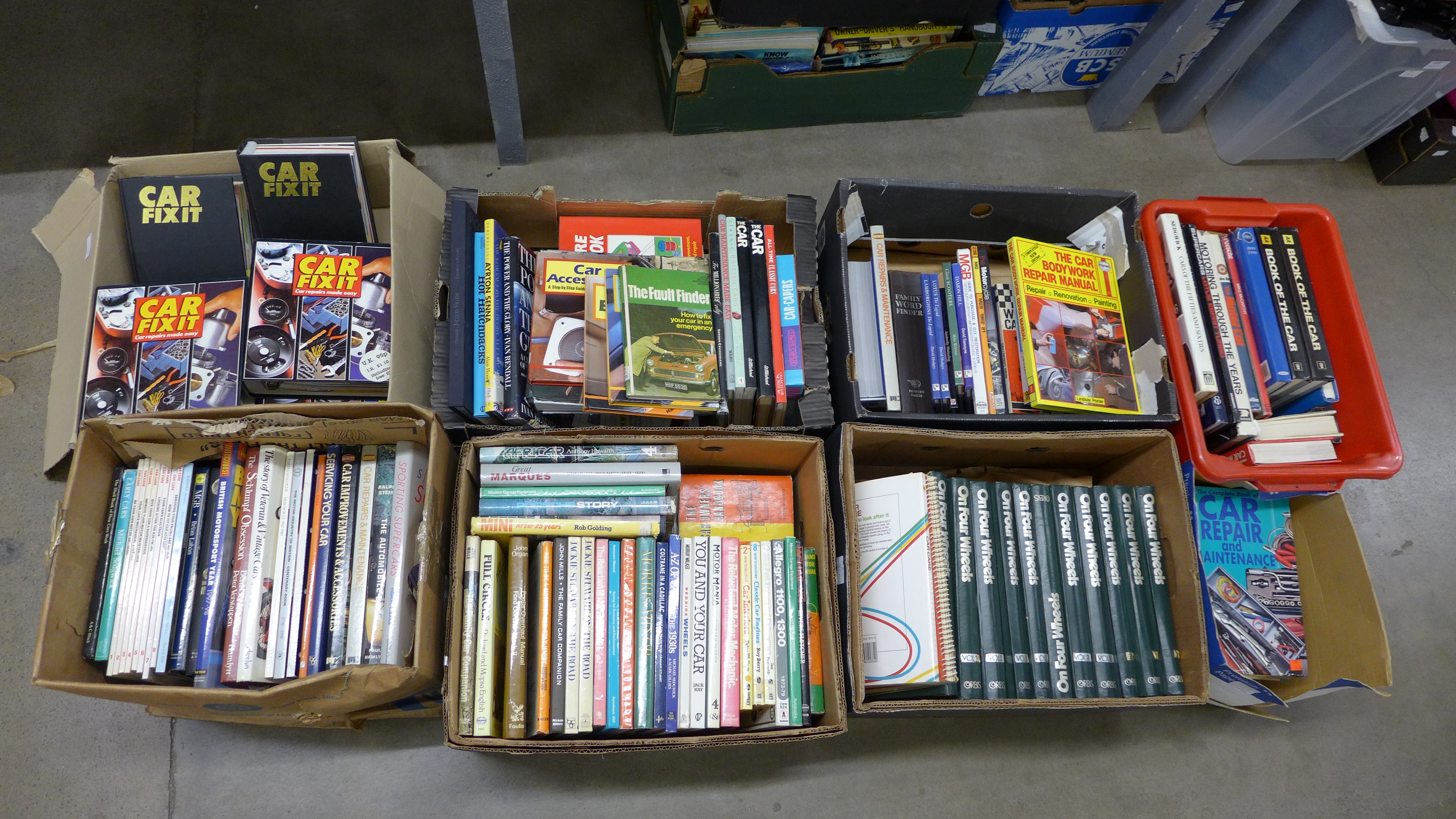 Eight boxes of motoring books including Car Fixit bound magazines and other maintenance guides