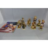 Eleven MJ Hummel figures including Appletree Boy and Girl, Which Hand?, etc., with a Hummel