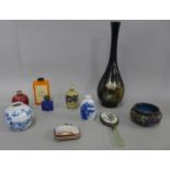 A metal vase with Mount Fuji decoration, a small hand mirror and other oriental style decorative