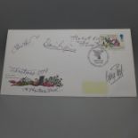 A Manchester United signed first day cover; George Best, Denis Law, Bobby Charlton, Shay Brennan