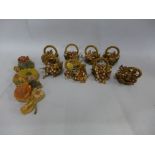 Eight French beaded glass napkin rings and a floral wax plaque
