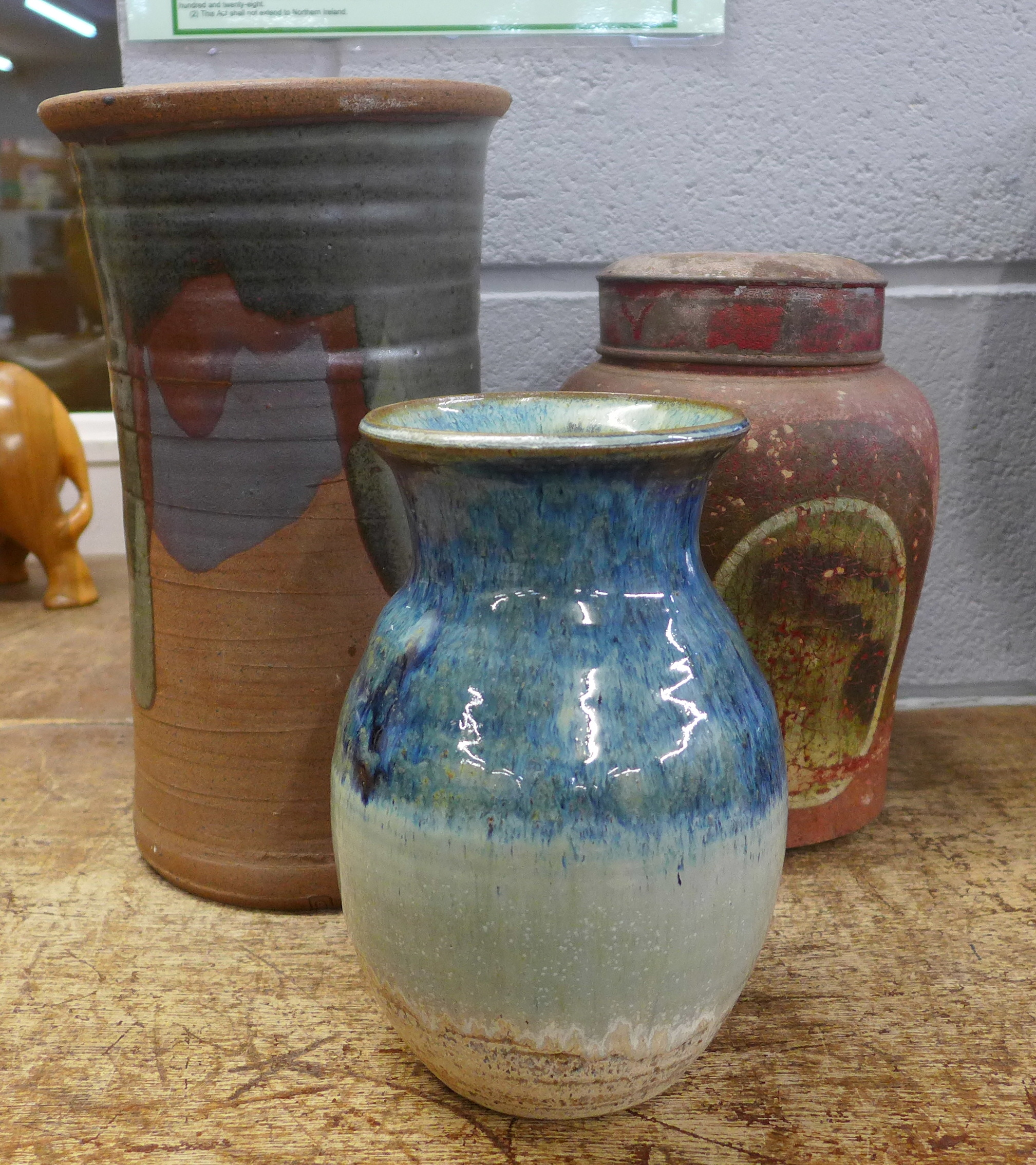 A studio pottery vase, cylindrical vase and a Victorian tea caddy