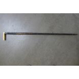 A Victorian sword stick with ivory handle and silver collar