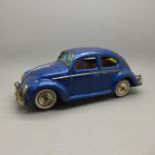 A 1960's tin-plate Japanese VW Beetle