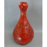 A Chinese red glaze vase decorated with two dragons, 39cm