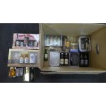 A collection of Scotch whisky miniatures including box sets, Bowmore, Famous Grouse, Glenmorangie,