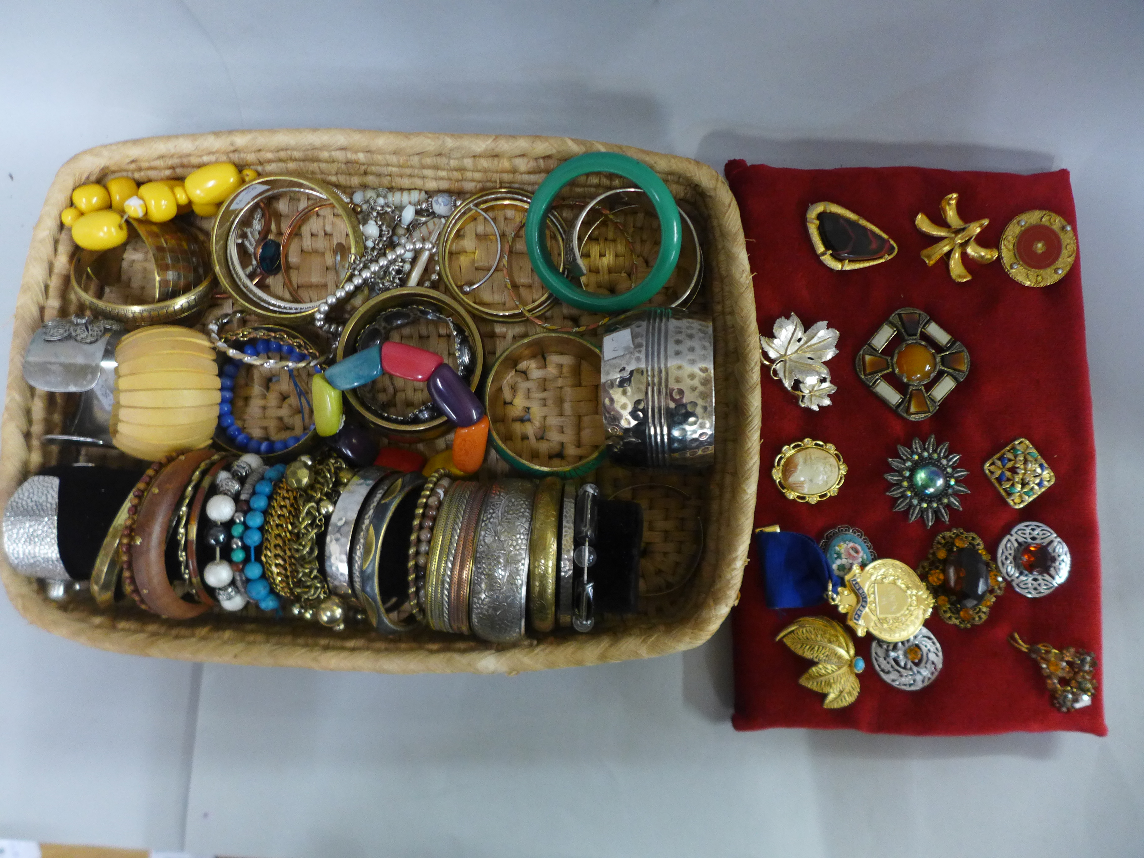 Costume brooches and bangles, etc.