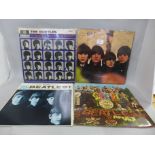 A collection of LP records, The Beatles and Rolling Stones (11)