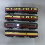 Four Bachmann 00 gauge model railway coaches
