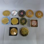 A collection of eleven compacts