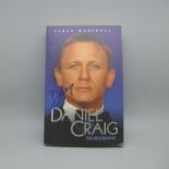Daniel Craig, The Biography paperback, signed on the cover
