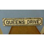 A vintage cast iron Queens Drive road sign