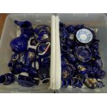 Fifty-eight pieces of cobalt blue Japanese porcelain including a coffee set, vases and pots