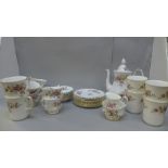 A Royal Albert Moss Rose coffee set including cup and saucers, side plates, mugs, etc.