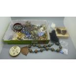 A tray of costume jewellery, compact, plated belt, etc.