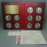 The Queen's Beasts, ten silver plated heraldic coins in folder with certificate of ownership