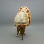 A carved shell cameo table lamp on a gilt metal base, 23cm