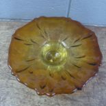 A 1970's amber glass bowl
