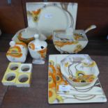 Clarice Cliff The Biarritz Rhodanthe pattern tablewares, four rectangular platters, a dessert