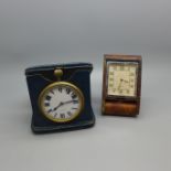 Two travel clocks, Le Coultre and one marked Harrods, with 8 Days movements