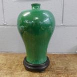 A Chinese crackle glaze vase, hairline crack on the base, height including stand 37cm