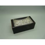 A silver topped jewellery or trinket box with Reynold's Angels, 123mm wide