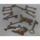 A collection of antique door keys