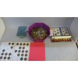 A tub of British coins, commemorative crowns and world coins