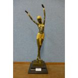 Manner of Dimitri Chiparus, Art Deco style gilt bronze figure of an exotic female dancer, on black