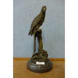 A French style bronze figure of a parrot, on black marble socle